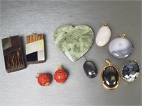 Polished stone, cinnabar & wood pendants