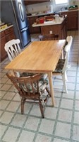 Kitchen table with 4 mismatched chairs