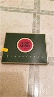 Vintage Lucky Strike cigarette tin