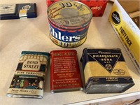 4 vintage tins