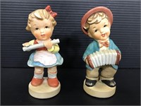 Pair of unbranded Hummel style ceramic figurines