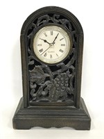 Carved wood quartz mantle clock