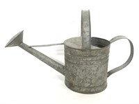 Vintage galvanized metal watering can