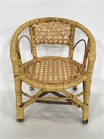 Small vintage wicker doll chair