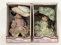 Pair of Christina Collection porcelain dolls in