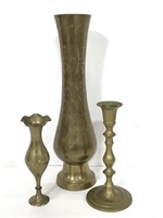 Two brass candlestick holders w/ one brass vase
