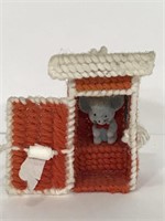 Handmade knit mouse in an outhouse ornament