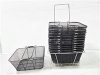 Mesh metal shopping baskets in stand