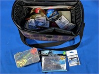 Storage bag with fishing accessories 13" x 9" x