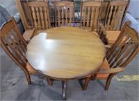 Wooden dining table 42" D with one leaf