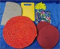 Assorted place mats 4"-14" and one small chopping