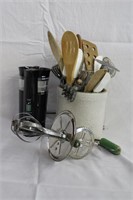 Kitchen utensils in crock and Mr Coffee grinder