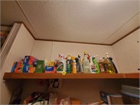 SHELF OF CLEANING SUPPLIES AND WRAP