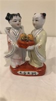 Asian couple figurine