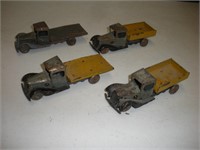 4 Vintage Tin Toy Trucks (6in.)