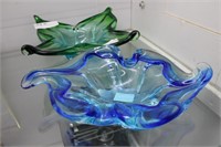 Two art glass wave motif center dishes in royal
