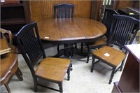 Contemporary oval dining table with black painted