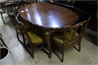 Claw foot dining room table with six chairs with