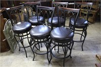 Six contemporary leather seated metal bar stools