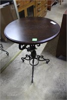 Contemporary cast metal based round end table 20”