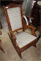 Ladies sewing rocker with floral needlepoint and