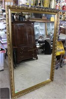 Large gold framed hall mirror.42 x 6 in.