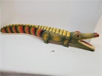 Wood carved and painted crocodile