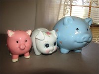 3 Piggy Banks. Blue is 6" T