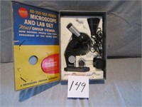 Gilbert microscope and lab set in metal case