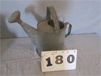 Galvanized watering can with spout