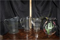 4 pitchers (1 plastic, 2 damaged)