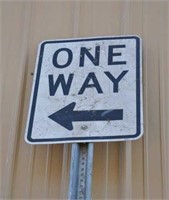 "One Way" sign and post