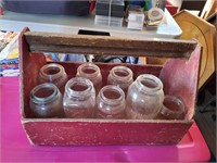 old wooden toolbox full of older jars