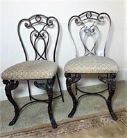 Two Wrought Iron Egyptian Theme Chairs