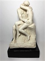 Cast Statue of Couple Kissing