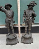 2 metal statues