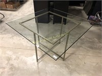Square glass top table with metal base