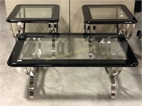 Three-piece black, chrome, and glass table set