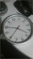 Battery operated silver wall clock