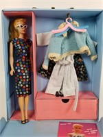 Barbie, clothes and case
