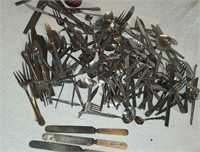 Stainless flat where 3 butter knives with bone