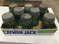 Eight vintage Ball canning jars all green with