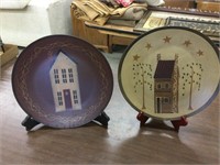 Two decorative plates with stands