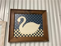 Swan photo in wood frame.