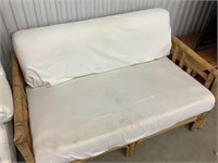 Bamboo loveseat with cushions, some wear