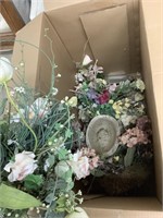 Box of fake floral arrangements