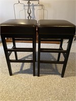 Two leather black stools