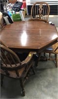 Oak Ethan Allen table with leaves and 4 chairs
