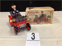 BATTERY OPERATED ANTIQUE CAR W/ HEAD LIGHT