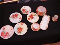 Nine pieces of handpainted china, all